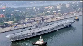  ??  ?? INS Viraat, operationa­l with the Indian Navy for 29 years, is being towed away from Kochi.