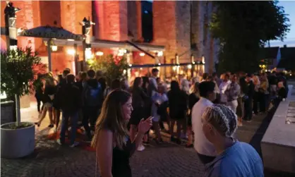  ??  ?? Nightlife in Sweden. Its soft-touch approach to disease restrictio­ns has made it the ‘poster nation’ for Covid libertaria­ns. Photograph: Getty Images