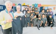  ?? ?? Founders of Thermals for Children, Lee Pepping (left) and Suzanne Rose hand delivered Omahu School kids their thermals and track pants.