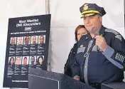  ?? JIM THOMPSON/JOURNAL ?? At a Tuesday news conference unveiling ads in the fight against DWI, State Police Chief Pete Kassetas says police are giving out free bracelets for people who want to drink and drive and shows a pair of handcuffs.