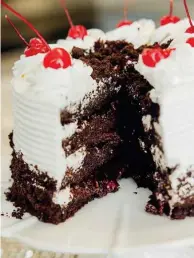  ?? ALFONSO DURAN/THE NEW YORK TIMES ?? The Black Forest cake is a favorite in many countries. Natasha Laggan made this one.