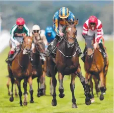  ?? STAYING POWER: Order Of St George wins the Irish St Leger. ??