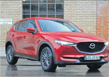  ?? PHOTOS: GRAEME FLETCHER/DRIVING ?? The 2018 Mazda CX-5 diesel handles curvy roads like a honed sports car.