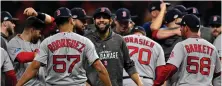  ?? STAFF PHOTOS BY CHRISTOPHE­R EVANS ?? HAPPY IN HOUSTON: Red Sox players celebrate Thursday after finishing off the AL Championsh­ip Series.