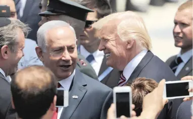  ?? PICTURE: EPA ?? TOUCHING BASE: US President Donald Trump is welcomed by Israeli Prime Minister Benjamin Netanyahu on arrival at Ben Gurion Airport outside Tel Aviv, Israel, yesterday.