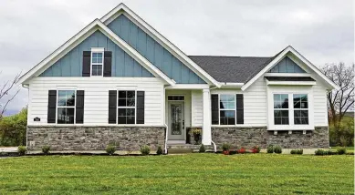  ?? KATHY TYLER/ CONTRIBUTE­D ?? On the market for $674,900, the stone-and-concrete house in Washington Twp. has about 2,942 square feet of living space — including the finished recreation room.