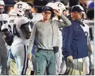  ?? Mark Humphrey / Associated Press ?? UConn coach Lou Spanos watches from the sideline during Saturday’s loss at Vanderbilt in Nashville.