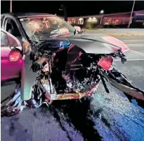  ?? ?? Three members of the public inside this car were seriously hurt when two cars containing rival gang members ploughed through a red light and smashed into them.