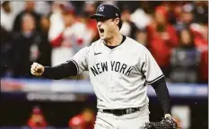  ?? Christian Petersen / Getty Images ?? The Yankees’ Gerrit Cole reacts after striking out a batter at Cleveland in the ALDS on Sunday.