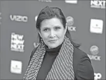  ?? Associated Press ?? Officials say actress Carrie Fisher died from sleep apnea and a combinatio­n of other factors, but they could not conclusive­ly determine what caused her death. Los Angeles coroner’s officials said in a news release late Friday that Fisher had buildup of...