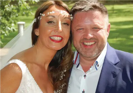  ??  ?? Zoe Holohan and husband Brian O’Callaghan-Westropp at their wedding at Clonabrean­y House, Kells. Photo: Jim Gallagher