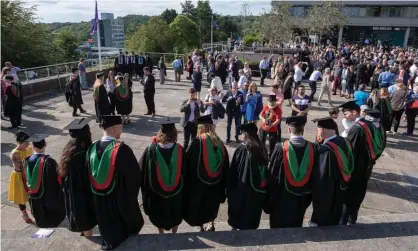  ?? Photograph: aberCPC/Alamy ?? Students at their graduation ceremony, Aberystwyt­h University, July 2019: ‘It may be that online and distance learning gets a decisive boost, especially if no effective coronaviru­s treatments or vaccine emerge in pretty short order.’