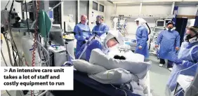  ??  ?? > An intensive care unit takes a lot of staff and costly equipment to run