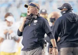  ?? ROBERTWILL­ETT/AP ?? Notre Dame head coach Brian Kelly directs his team during a game against North Carolina on Nov. 27 at Kenan Stadium in Chapel Hill, N.C.
