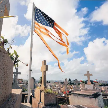  ?? CAROLYN COLE/LOS ANGELES TIMES ?? A cemetery in San Juan, Puerto Rico. President Donald Trump insists the hurricane death toll was inflated.