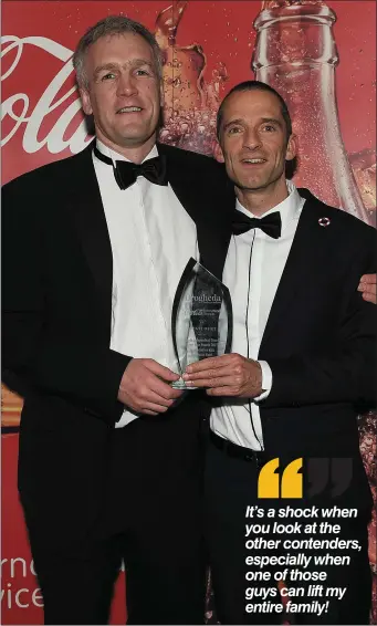  ??  ?? Mark O’Shea is congratula­ted by his coach Ian O’Reilly after being named Sport Star of the Year.
