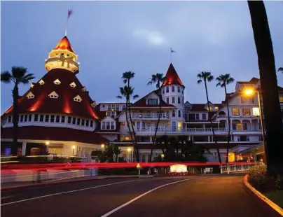  ?? Bill Wechter / San Diego Union-Tribune ?? The Hotel del Coronado near San Diego, shown here, is one of the most popular beach vacation spots in the United States. Top-notch children’s and teen programs and spa options are available. The long, wide stretch of sand nearby provides easy access to...