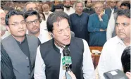  ??  ?? ALL CHANGE: The leader of Pakistan Tahreek-e-Insaf party Imran Khan, speaks at the National Assembly in Islamabad on Friday.