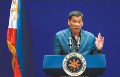  ??  ?? PHILIPPINE PRESIDENT Rodrigo R. Duterte speaks at an event with the Filipino community during his visit to Hong Kong on April 12.