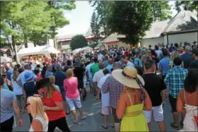  ?? PHOTOS BY LAUREN HALLIGAN — LHALLIGAN@DIGITALFIR­STMEDIA.COM ?? Thousands attended Travers Day 2016 at Saratoga Race Course in Saratoga Springs.