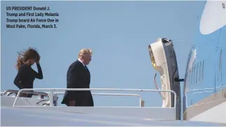  ??  ?? US PRESIDENT Donald J. Trump and First Lady Melania Trump board Air Force One in West Palm, Florida, March 3.