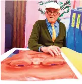  ??  ?? British artist David Hockney poses with his book “SUMO - A Bigger Book” during the Frankfurt Book Fair in Frankfurt am Main, western Germany, yesterday. — AFP