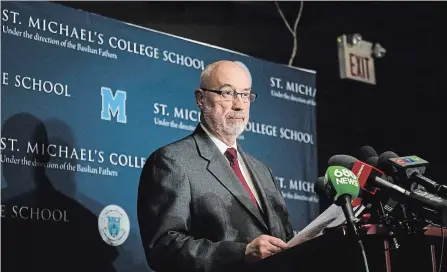  ?? CHRISTOPHE­R KATSAROV THE CANADIAN PRESS ?? St. Michael’s College principal Gregory Reeves speaks to reporters in Toronto on Monday.