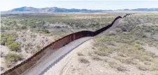  ?? ?? This aerial picture taken shows the US-Mexico border wall in Sasabe, Arizona.