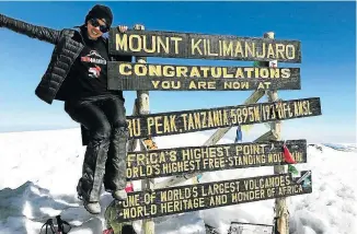  ??  ?? HIGH POINT: Gillian Pillay, 38, summited the highest peak in Africa earlier this month to raise funds for sanitary pads for pupils