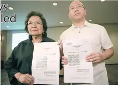  ?? PHOTO BY BOB DUNGO JR. ?? Former human rights chief Etta Rosales and her lawyer, former solicitor general Florin Hilbay, file a petition to invalidate the extension of martial law before the Supreme Court on Friday. It was the third petition against martial rule in Mindanao.