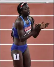  ?? MARTIN MEISSNER — THE ASSOCIATED PRESS ?? The United States’ Tori Bowie celebrates after winning the Women’s 100 meters final at the World Athletics Championsh­ips in London on Aug. 6.