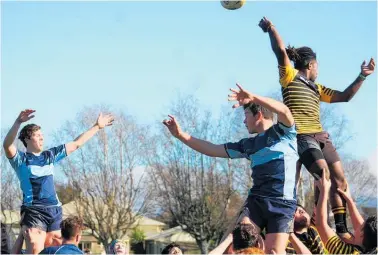  ??  ?? Flanker Toby Christini soars high to win the ball even with his eyes closed.