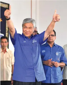  ??  ?? Ahmad Zahid arrives for the meeting with the Indian community organised by the Bagan Datuk myPPP. — Bernama photo