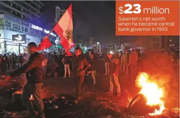  ?? Reuters ?? ■
Demonstrat­ors block a road with burning tyres during a protes against the fall of the Lebanese pound and mounting economic hardships, in Jal Al Dib, Lebanon, on Thursday.