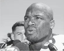  ?? MANUEL BALCE CENETA THE ASSOCIATED PRESS FILE PHOTO ?? Adrian Peterson was sued over failure to fully repay a US$5.2-million loan and was ordered to pay $2.45 million to another creditor.