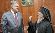  ?? [AP FILE PHOTO] ?? Ecumenical Orthodox Patriarch Bartholome­w I, right, speaks with Ukrainian President Petro Poroshenko in April in Istanbul, Turkey.