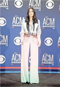  ??  ?? Female Artist of the Year winner Kacey Musgraves poses in the press room during the 54th Academy Of Country Music Awards.