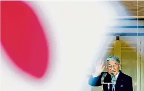  ??  ?? Long reign: A file photo of Akihito waving to well-wishers at the Imperial Palace in Tokyo. — Reuters