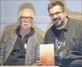  ?? Provided, J. Blake Fichera ?? Author J. Blake Fichera, right, with “Halloween”director John Carpenter, who also wrote the film’s musical score.