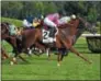  ?? PHOTO NYRA ?? It was declared a dead heat between Channel Maker (outside) and Glorious Empire (inside) at the line Saturday in the G2 Bowling Green stakes.