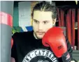  ?? BERND FRANKE/POSTMEDIA NEWS ?? Dennis Steingart, 24, of St. Catharines improved his record to 12-1 with a victory for the gold medal at the Ringside World Boxing Championsh­ips in the 165-pound senior novice division.