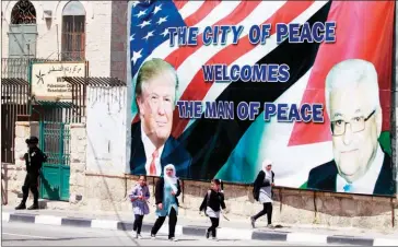  ?? HAZEM BADER/AFP ?? A billboard welcoming US President Donald Trump is seen in Bethlehem yesterday during his visit to the West Bank town.