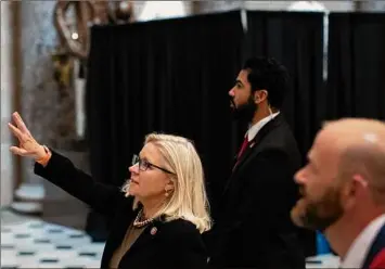  ?? Tom Brenner / New York Times ?? Rep. Liz Cheney, R-wyo., a member of the House committee investigat­ing the Jan. 6 attack, leads visitors on a tour of the Capitol in Washington. The committee Thursday issued subpoenas to five Republican lawmakers, including minority leader Rep. Kevin Mccarthy.