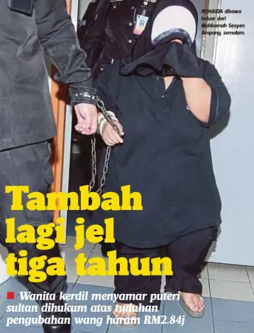  ??  ?? ROHAIDA dibawa keluar dari Mahkamah Sesyen Ampang, semalam.