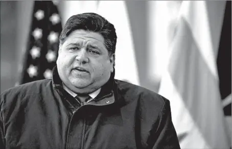  ?? ANTONIO PEREZ/CHICAGO TRIBUNE ?? Gov. J.B. Pritzker, seen speaking at Soldier Field in Chicago on Nov. 11, has promised to deliver tax relief to property owners.