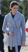  ??  ?? On Wednesday, Kate Middleton wore a grey alpaca coat by Toronto designer Bojana Sentaler.