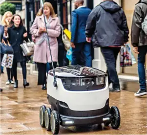  ??  ?? Take me to your freezer: The robot buggy during its trial run in London