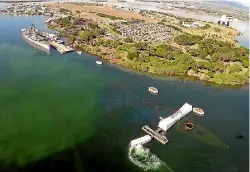  ?? PHOTOS: REUTERS ?? The USS Arizona Memorial and USS Battleship Missouri Memorial as seen from the air in Pearl Harbour in Honolulu, Hawaii.