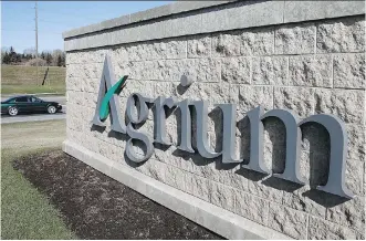  ?? THE CANADIAN PRESS ?? Despite challengin­g weather in Saskatchew­an, Alberta and B. C., Calgary- based Agrium reported higher earnings in Q2.