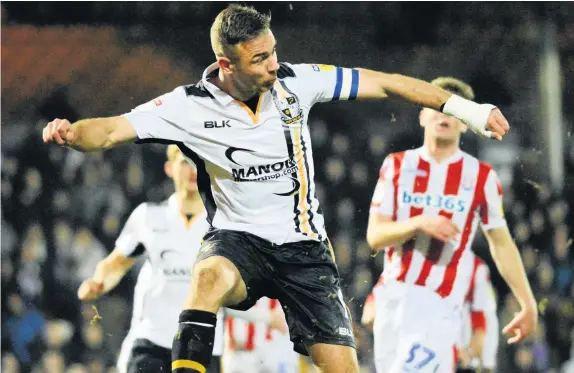  ??  ?? Port Vale striker Tom Pope scored one of the goals in a 4-0 victory over a young Stoke City side in the Checkatrad­e Trophy.